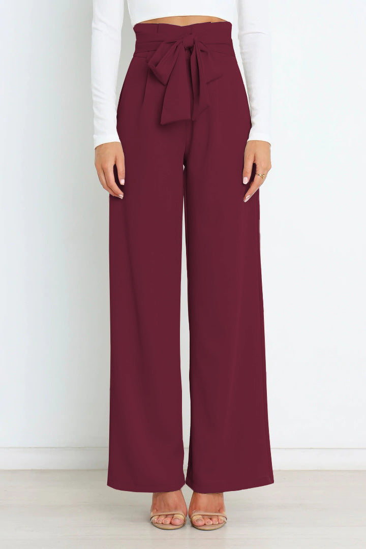 Leah | High-waisted broek met strikceintuur en wijde pijpen