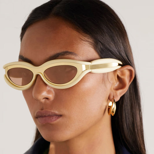 Yoko | Futuristische Ovale Zonnebril met Metaalaccenten
