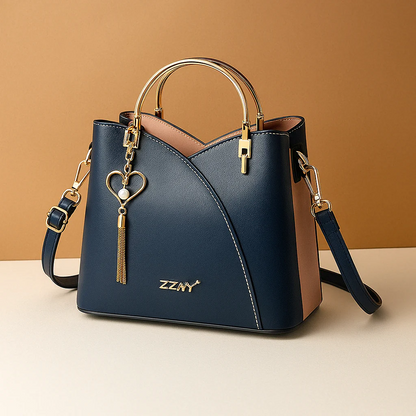 Raina - Schoudertas met geometrisch patroon en verstelbare riem voor dames